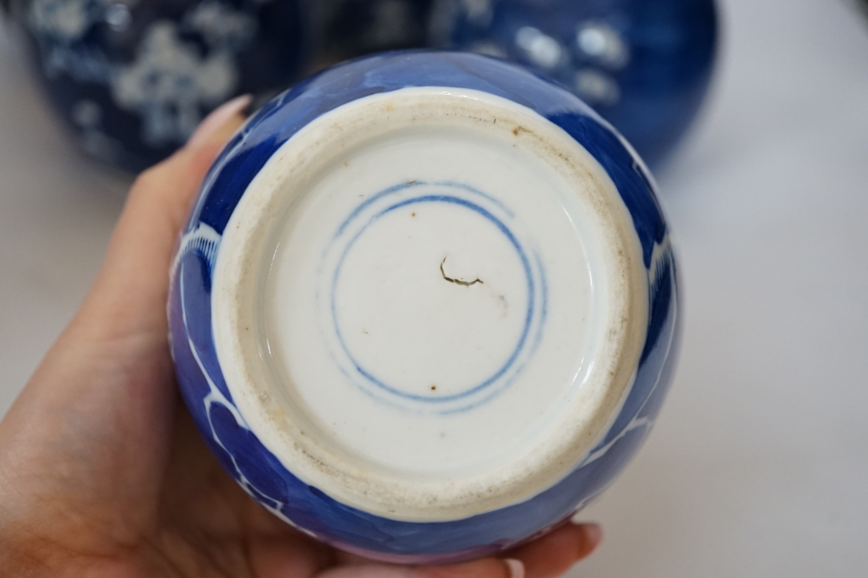 Five Chinese blue and white prunus jars and covers